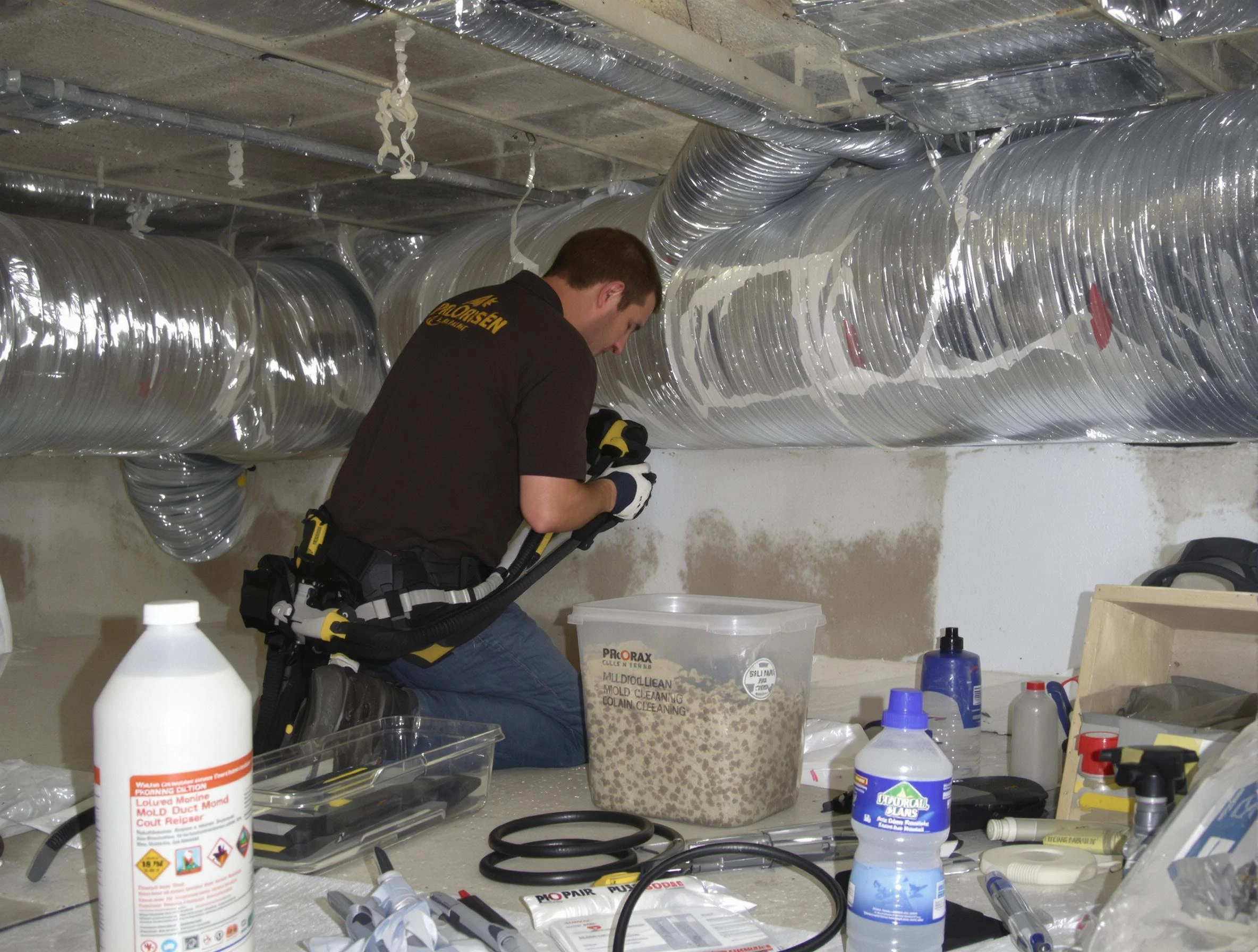 Arvada Air Duct Cleaning specialist performing professional mold removal from air ducts in Arvada